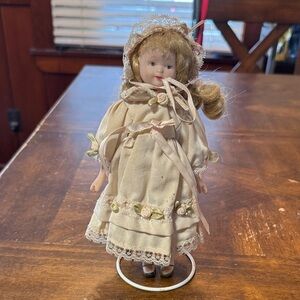 Porcelain Doll does show some wear otherwise in good used condition